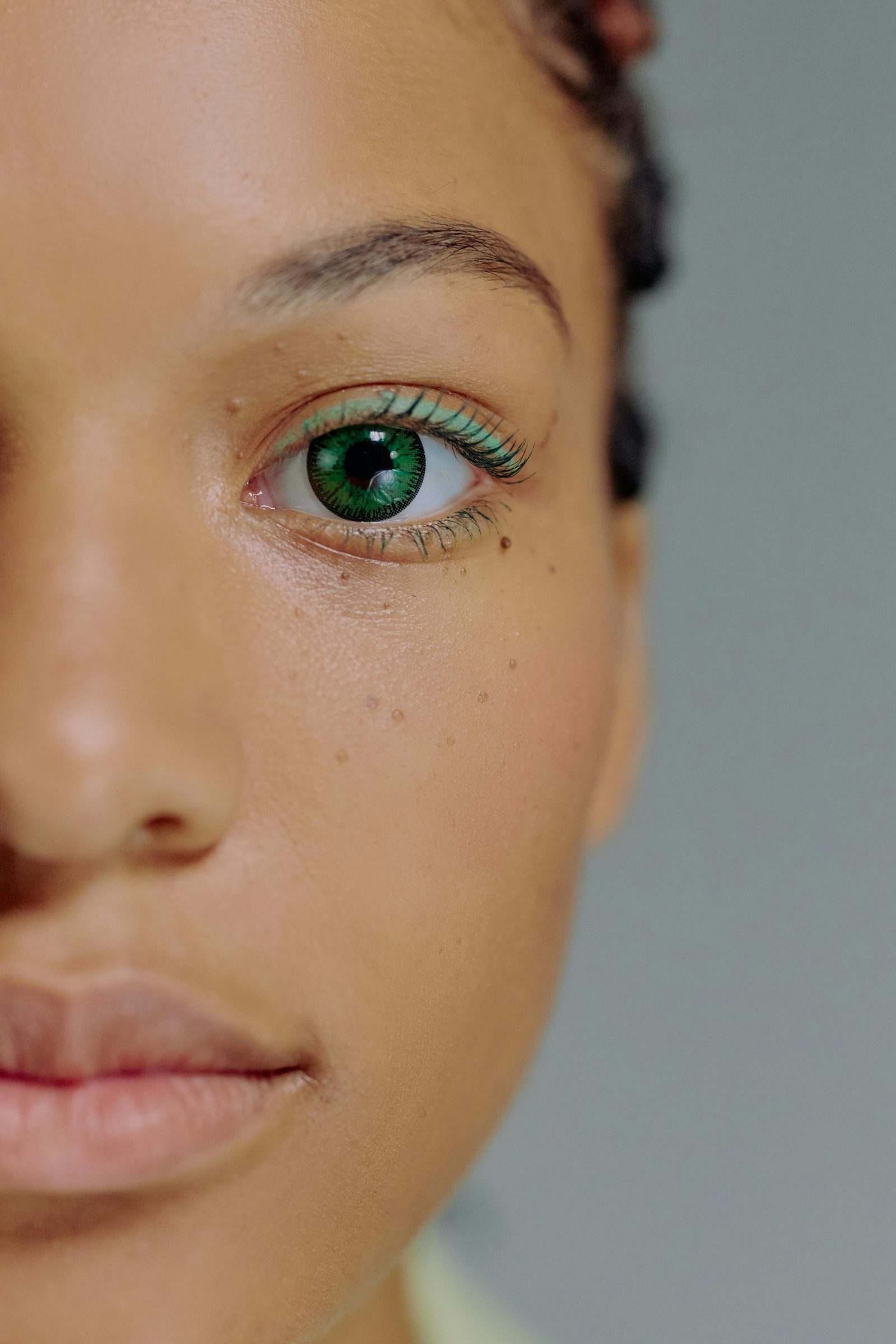Close-up of green contact lens eye